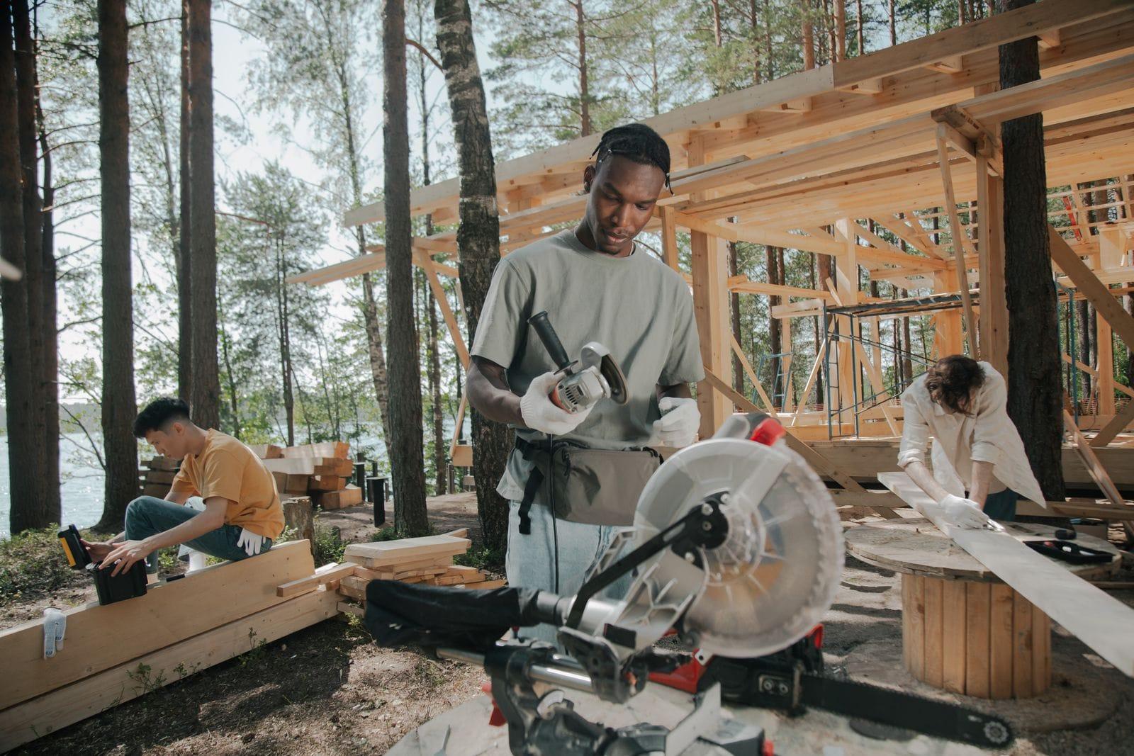 Carpenters framing a timber home addition